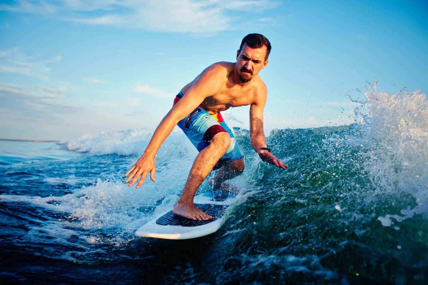 Focused Surfer Preparing for Upcoming High-Energy Ocean Competition